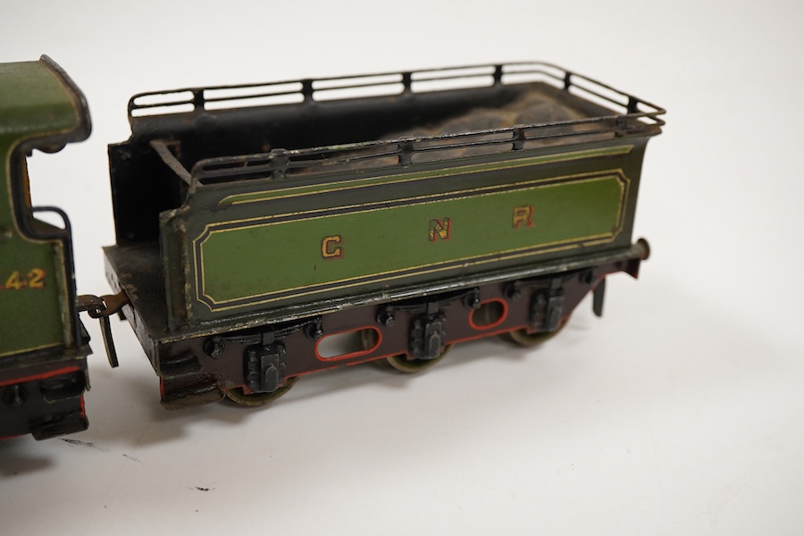 An 0 gauge Bing (or possibly Carette) for Bassett-Lowke tinplate clockwork GNR 4-4-2 tender locomotive, 1442, with original clockwork mechanism in yellow and black lined green livery